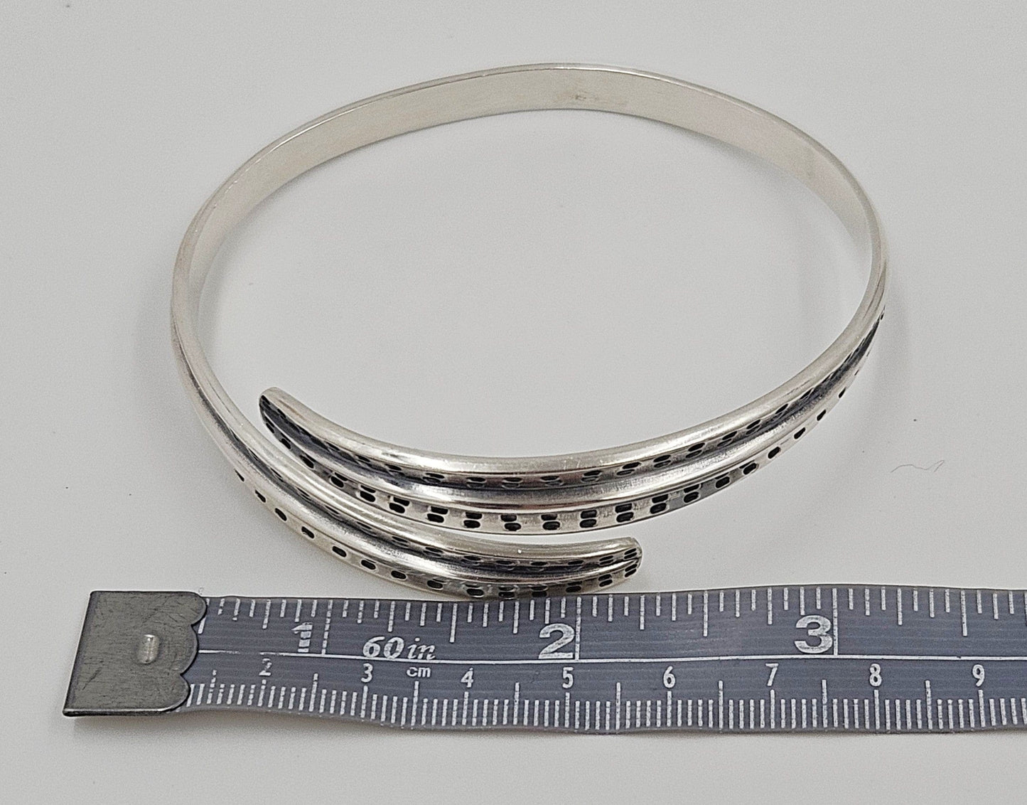 David Andersen Jewelry David Andersen Norway Sterling Viking Saga Series Bi-Pass Bangle Circa 1960's