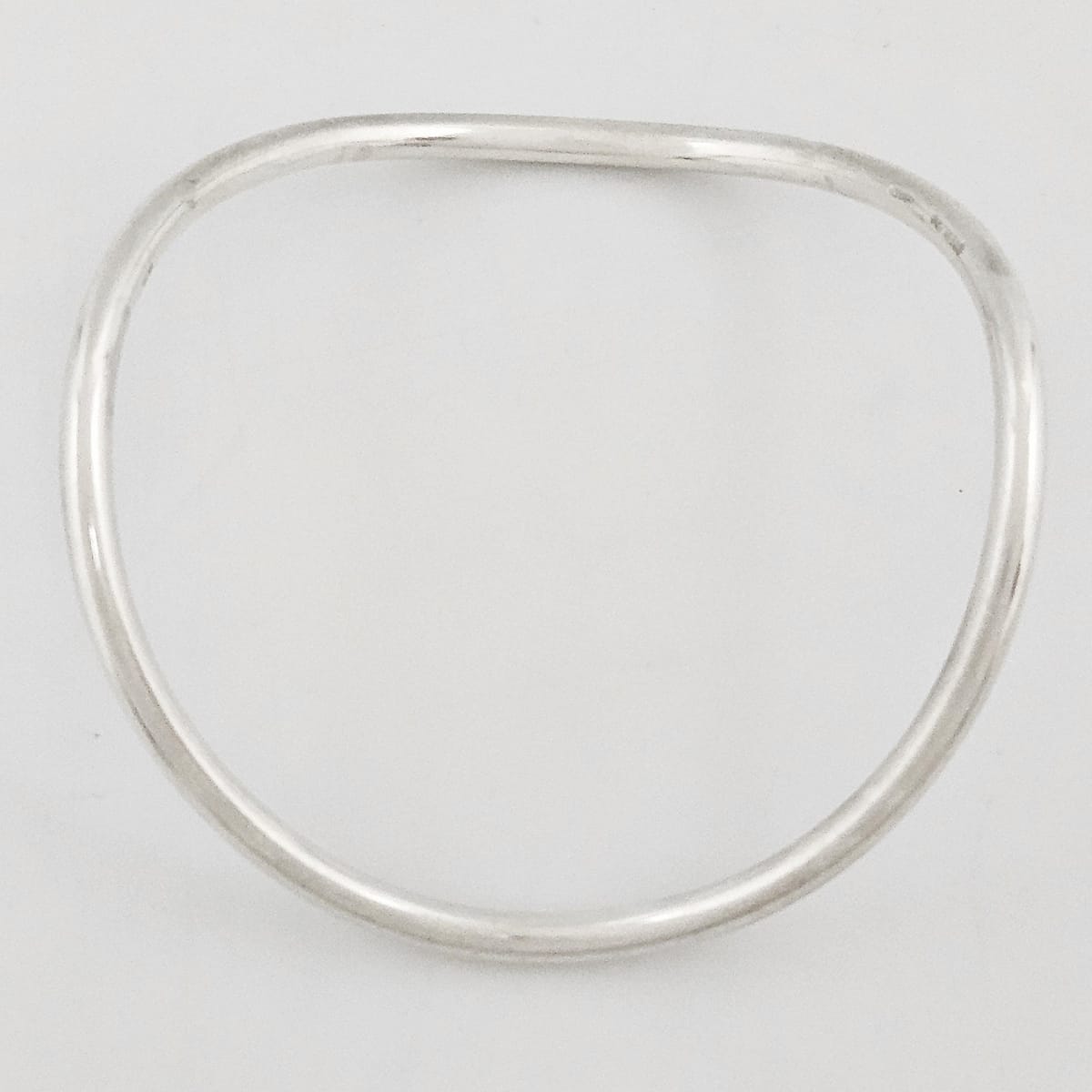 Betty Cooke sterling silver modernist Wavy Tubular Bangle Bracelet Circa 1960s, view 1 of 7