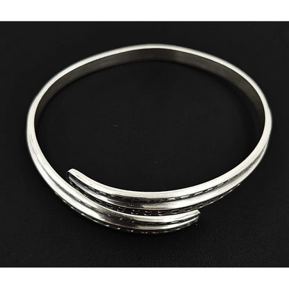 David Andersen Jewelry David Andersen Norway Sterling Viking Saga Series Bi-Pass Bangle Circa 1960&
