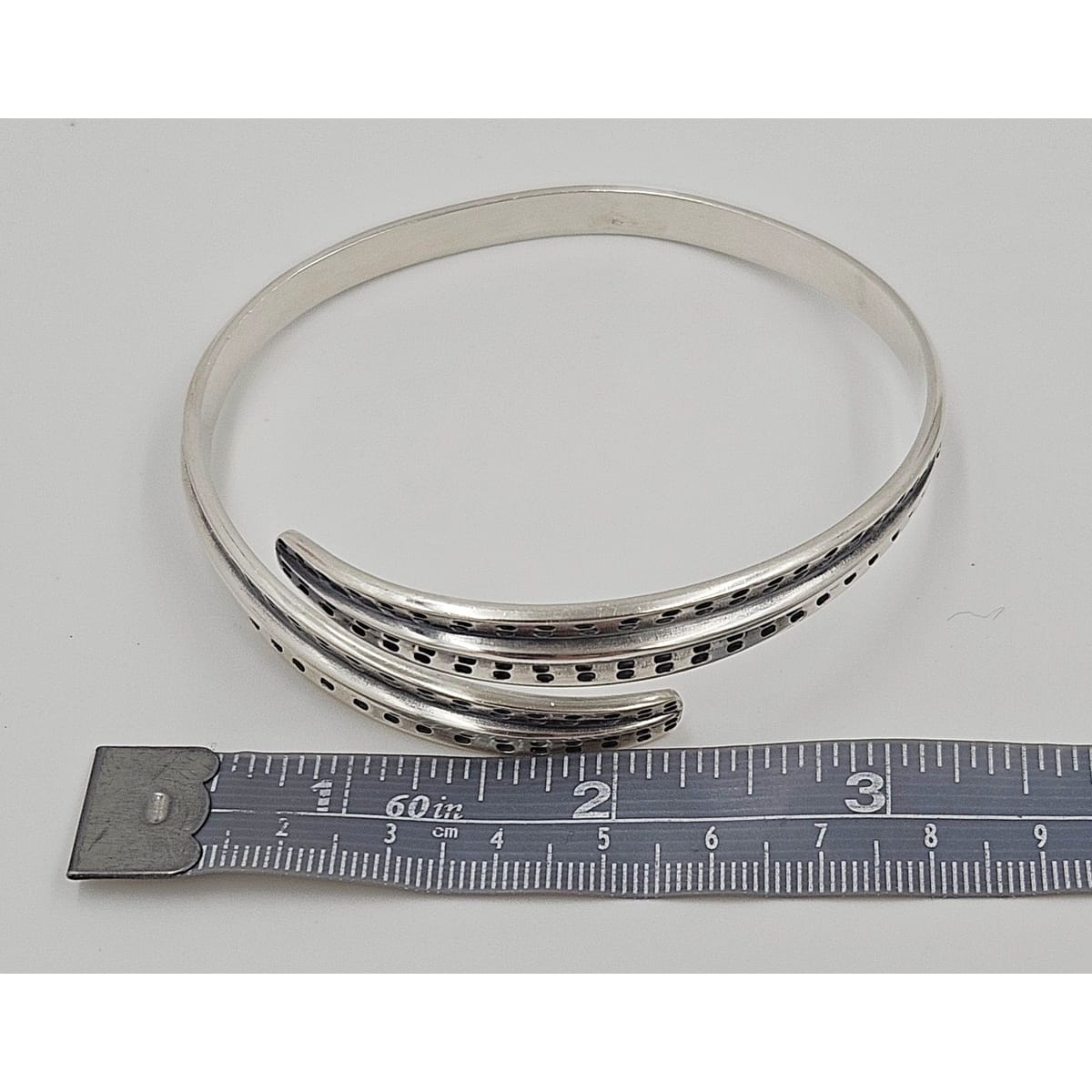 David Andersen Jewelry David Andersen Norway Sterling Viking Saga Series Bi-Pass Bangle Circa 1960&