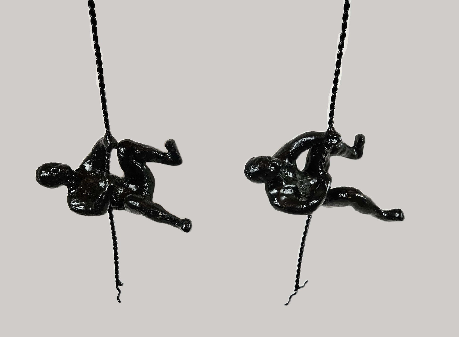 Global Views Artwork Global Views Matte Black Cast Iron Rock Wall Climber Men Wall Art Set of 2