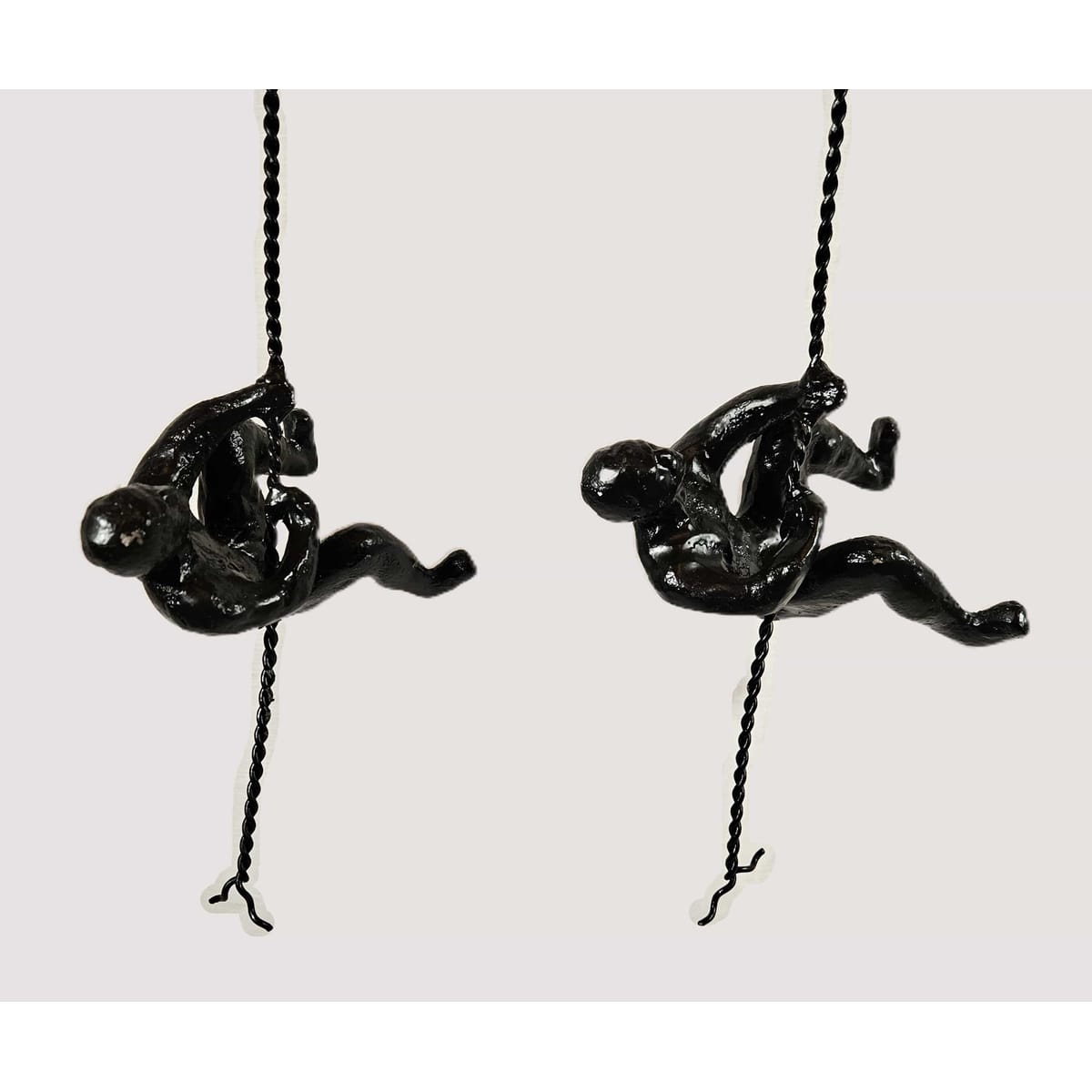 Global Views Artwork Global Views Matte Black Cast Iron Rock Wall Climber Men Wall Art Set of 2